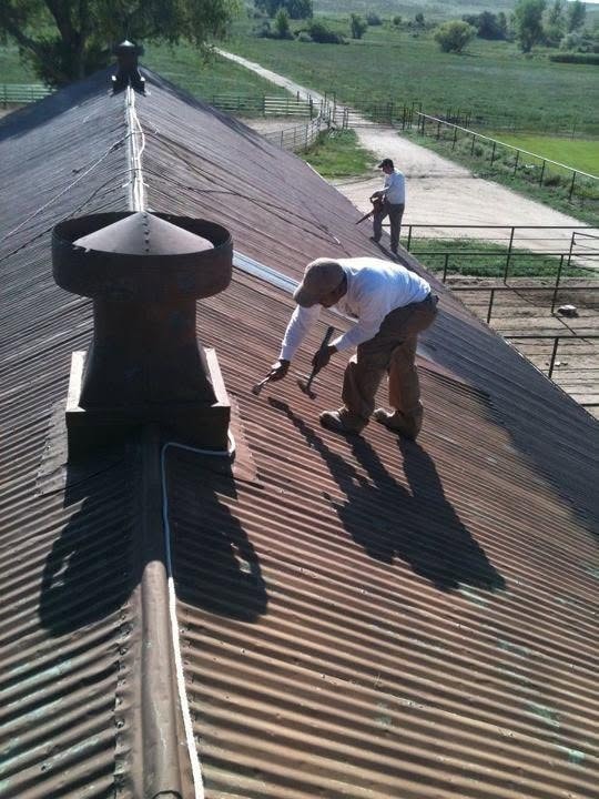 Residential roof with elastomeric coating applied in Pueblo, CO — Confident Coatings